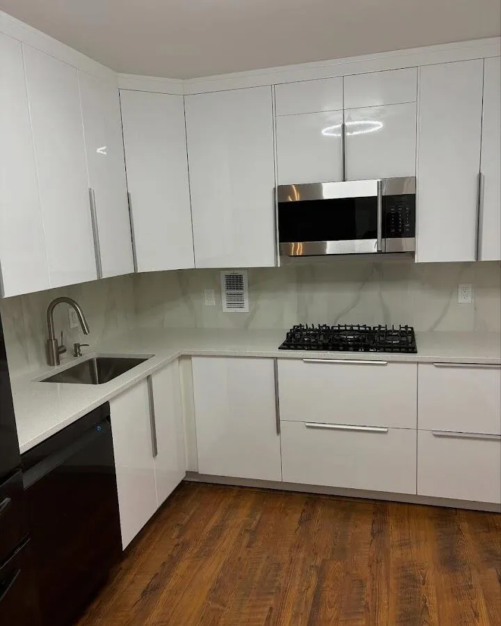 Restored kitchen with white cabinets after water damage in Lynwood